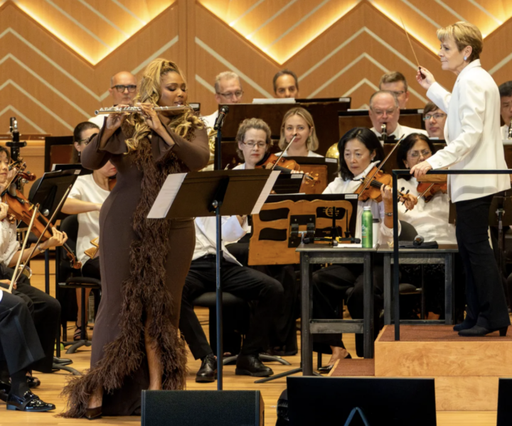 Lizzo plays the flute to Briccialdi’s “Carnival of Venice” with the Chicago Symphony Orchestra at Ravinia Festival in Highland Park on July 11, 2026. (Nate Swanson/for the Chicago Tribune)